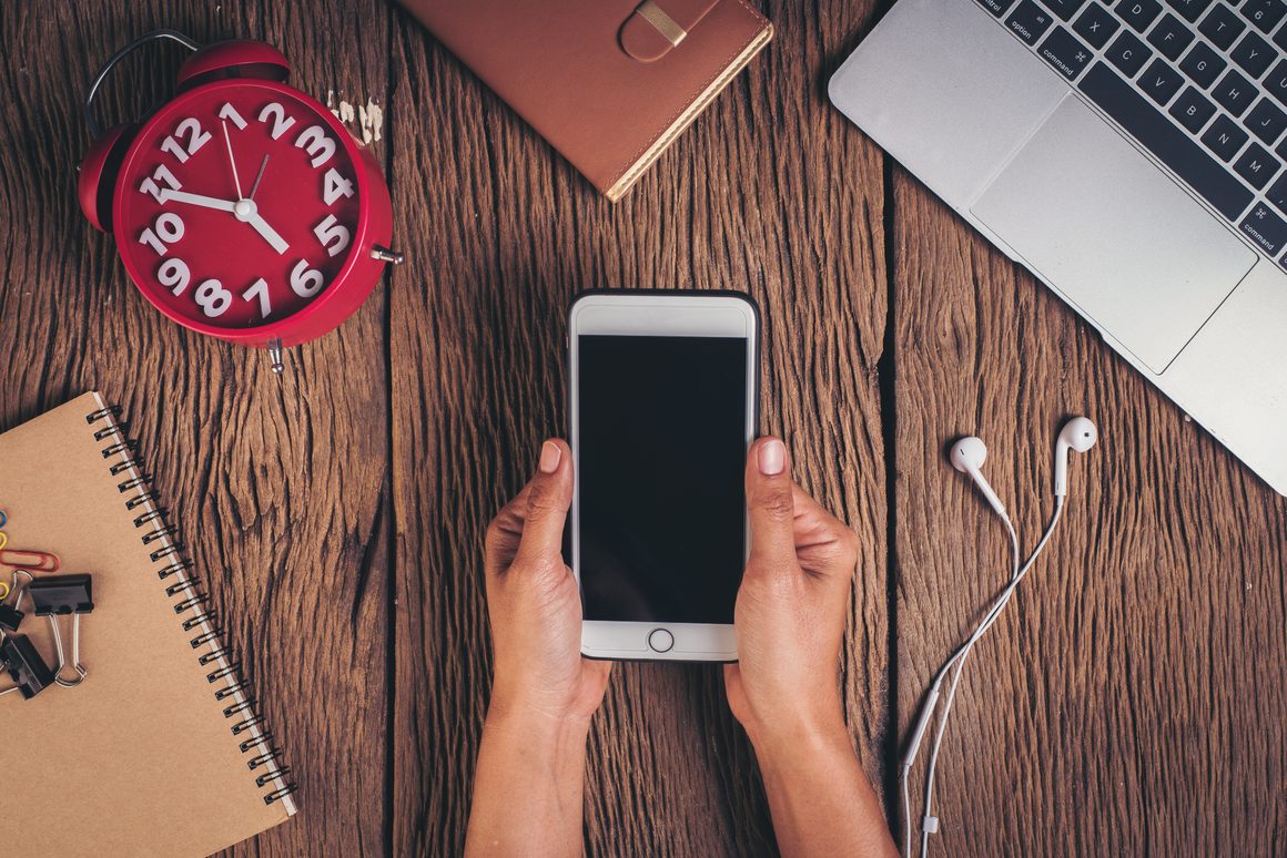 Newslikeyou.com Explores the Connection Between Technology, Work and Lifestyle 2 top view phone workspace wood background